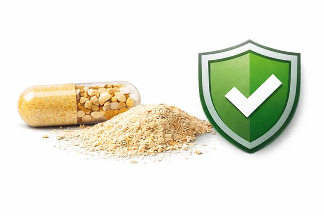 A lithium orotate supplement capsule with its contents spilled out next to a green shield icon featuring a white checkmark, symbolizing safety or approval.